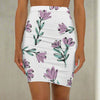 Floral mid-waist pencil skirt for women with purple flowers and green leaves on white background, fitted office wear for spring and summer.