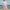 Women's aesthetic tie-dye one-piece swimsuit with pastel purple and pink hues, U-neck design, and lightweight fabric for summer beachwear