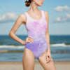 Women's aesthetic tie-dye one-piece swimsuit with pastel purple and pink hues, U-neck design, and lightweight fabric for summer beachwear