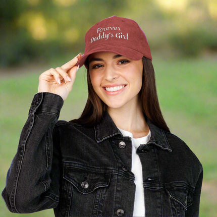 Woman wearing a vintage corduroy cap in maroon with 