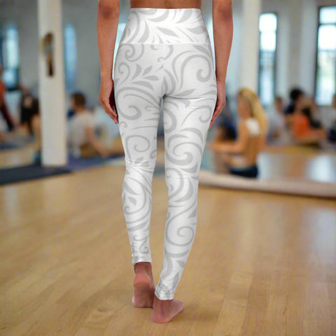 White leggings with a subtle pattern worn by a person on a white background